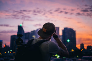 Photographer Capturing a City Skyline